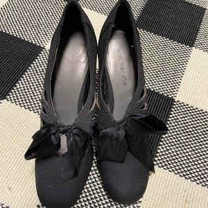 Black heels with a bow